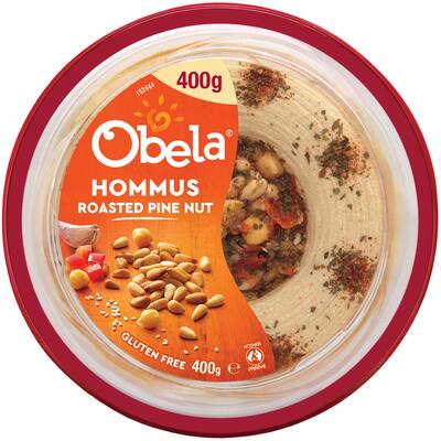 obela hummus pine nut garnished